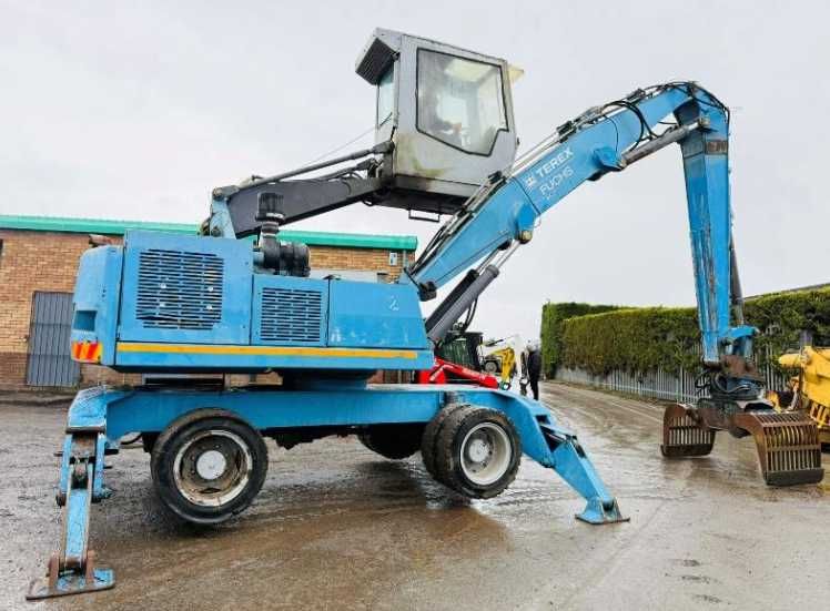 Екскаватор для перевалки лісу , металолома FUCHS MHL 320