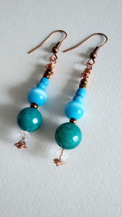 Brincos compridos azuis de inspiração étnica