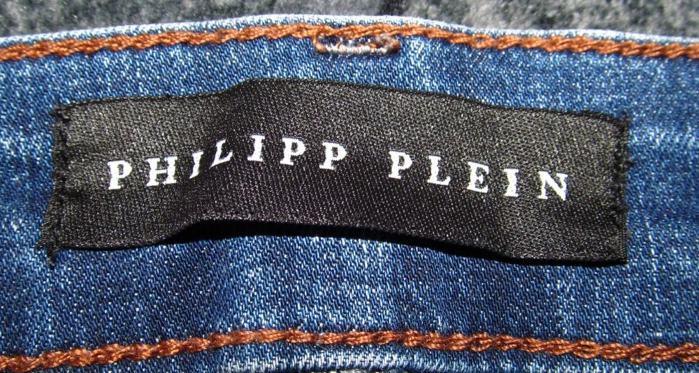 Темно-сині джинси