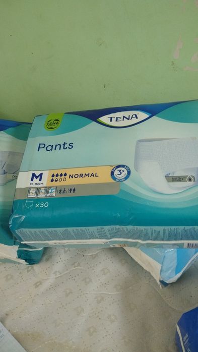 Підгузки памперси трусики Tena, Attends, ttolder
