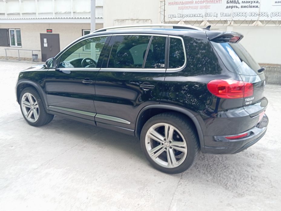 Volkswagen Tiguan 2014 VIN WVGAV7AX4FW009831 фото оголошення 7 з 24