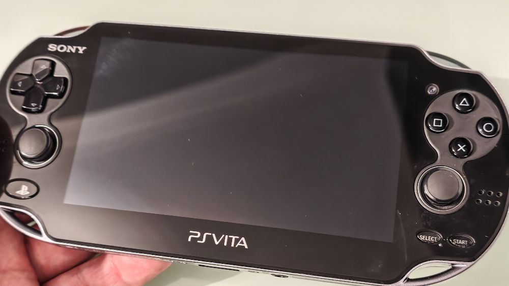 PS vita oled com jogos instalados muito bom estado