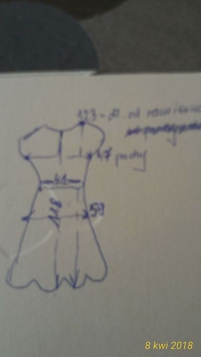 Ręcznie robiona .Wełniana sukienka ...