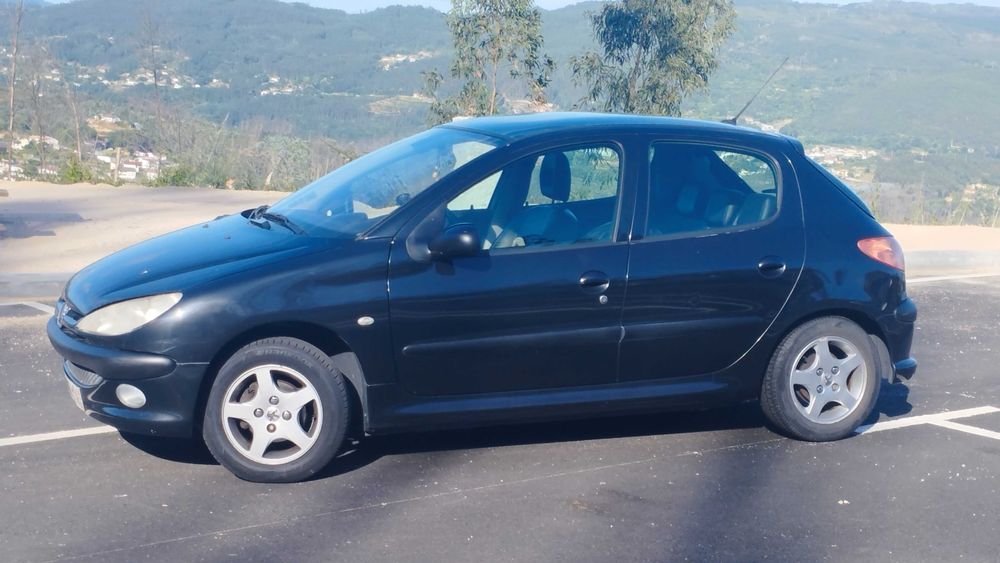 Peugeot 206 1.4 HDI Completo baixei pra vender logo.