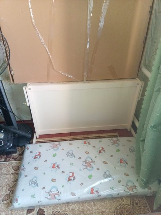 Дитяче ліжечко, кроватка з маятником