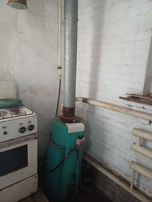 Продам 1/2 будинка в м.Богодухові