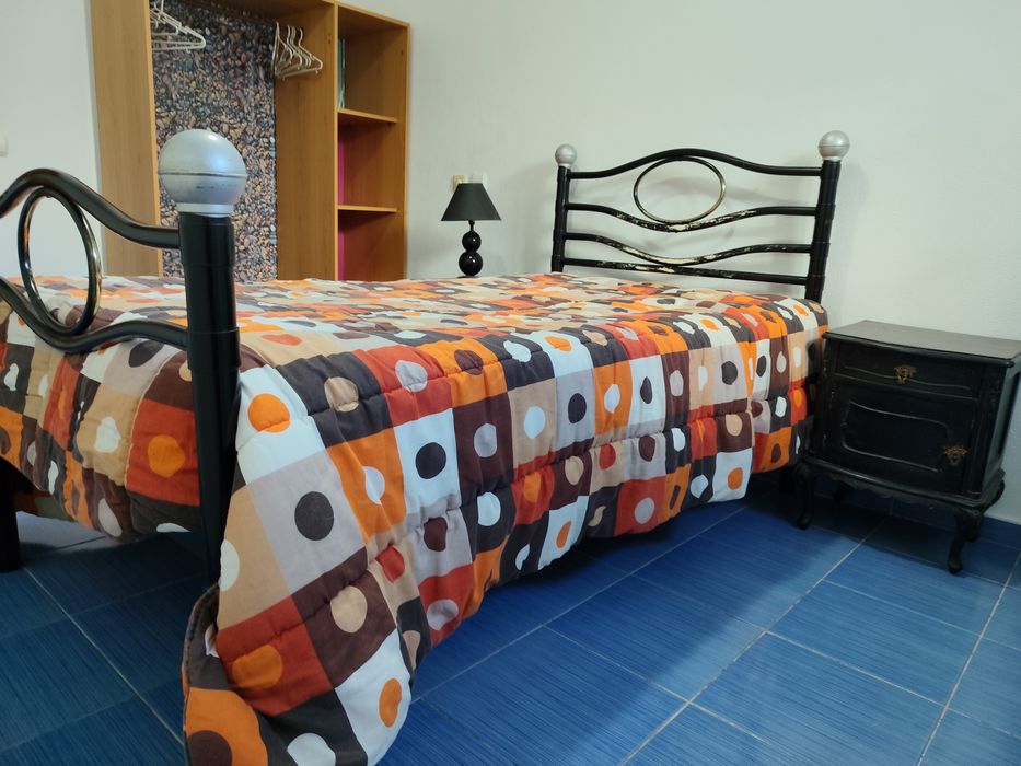 Quarto em Moradia