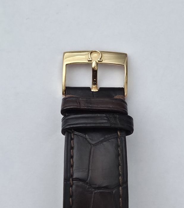 Швейцарскій годинник Omega De Ville