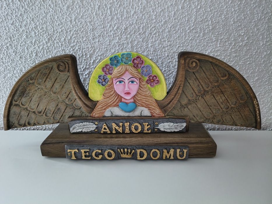 ,,Anioł Tego Domu"