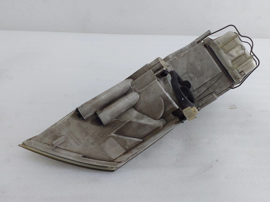 Ótica / farol esquerda SKODA Octavia II Break (1Z5)