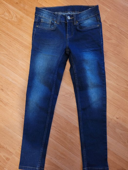 Spodnie jeansy dla dziewczynki rurki 128 yfk kik jak nowe
