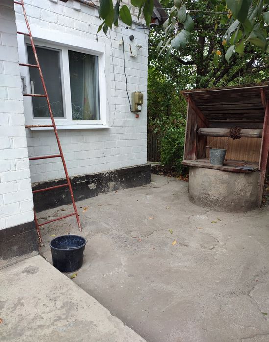 Продам в Харківській  обл, м.Балаклії 1/2 частку часного будинка