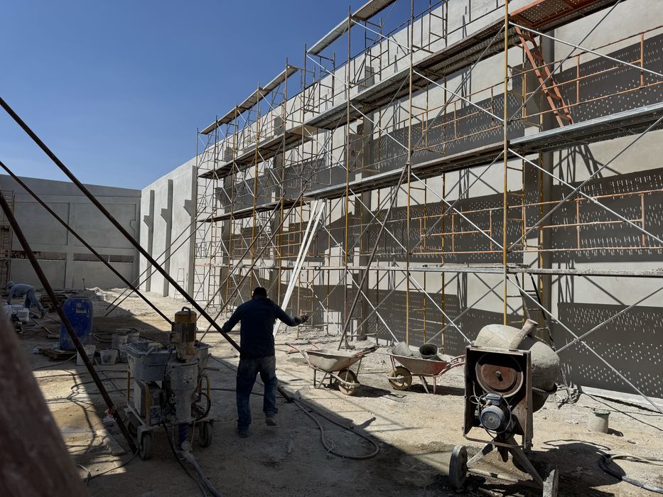 Equipa de estuque e reboco projetado