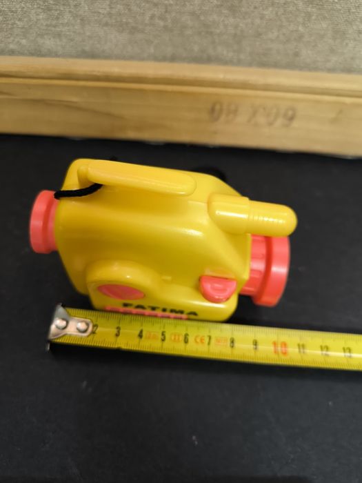 Brinquedo Câmera Fatima Amarela e Laranja.