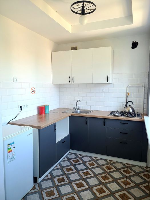 Затишна студія в центрі з балконом і видом на місто