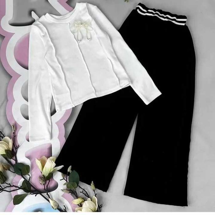 Продам костюм новый