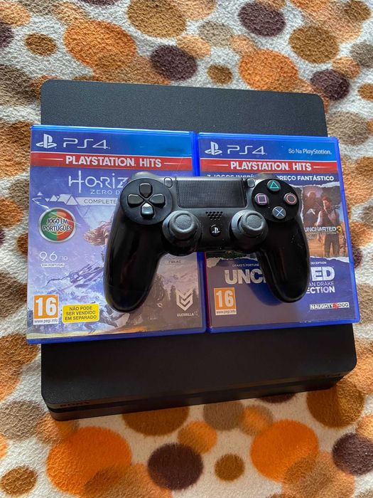 PS4 em perfeito estado com 1Tb 2 jogos e 1 comando tudo funcionando