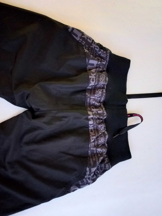 Штани спортивні плащівка, довжина 98 см.