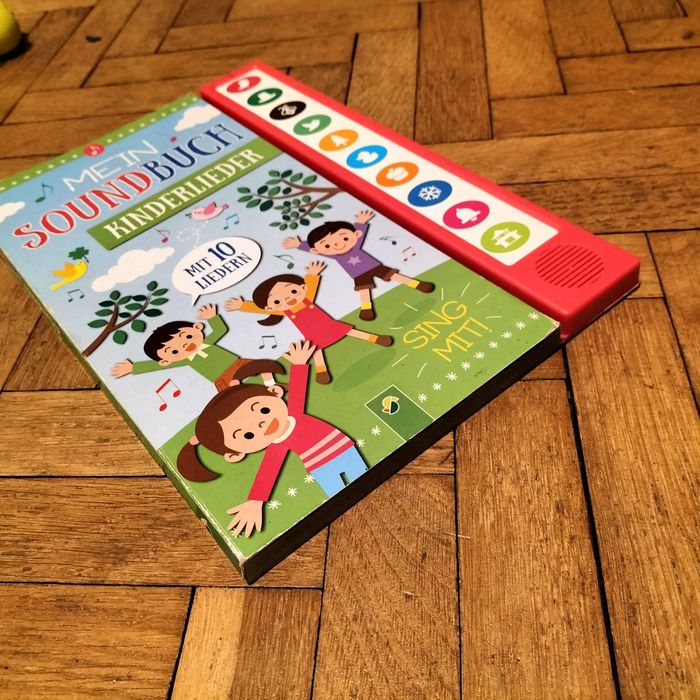 Książka dźwiękowa z melodiami piosenek wraz z bateriami