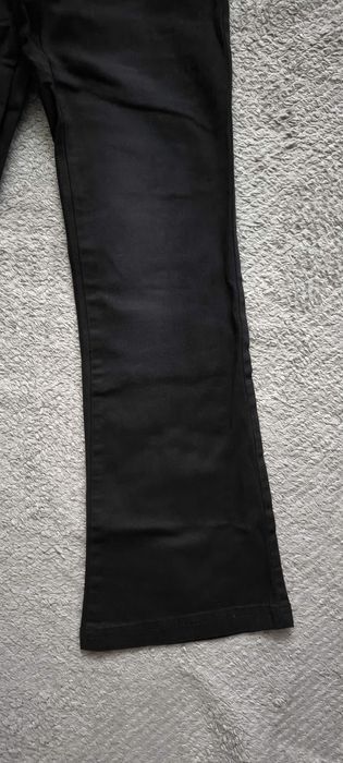 Nowe spodnie jeansowe coccodrillo r. 140 flare leg slim
