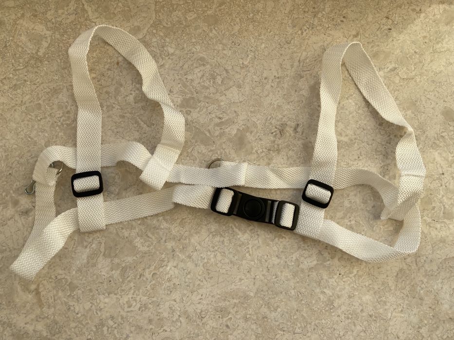 Ремень безпеки для дітячої коляски в люльку.