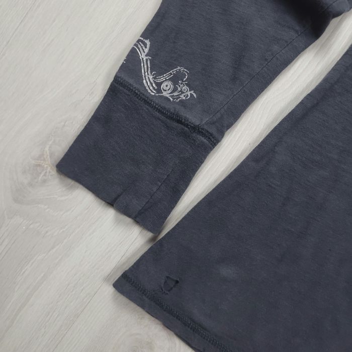 Camisa Carhartt de manga comprida com estampado vintage, estilo roupa