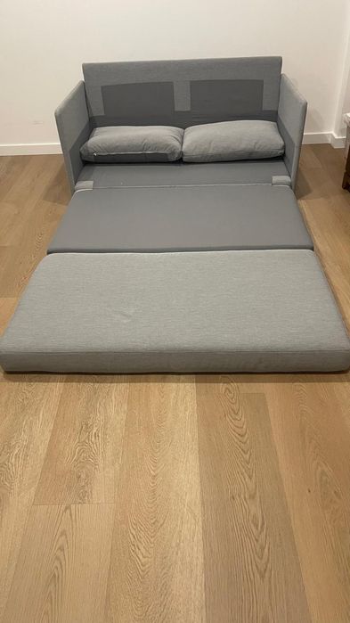 Sofá cama cinzento