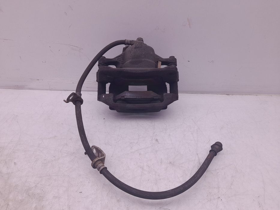 Pinça travão / maxila de travão frente esquerda TOYOTA Auris Touring S