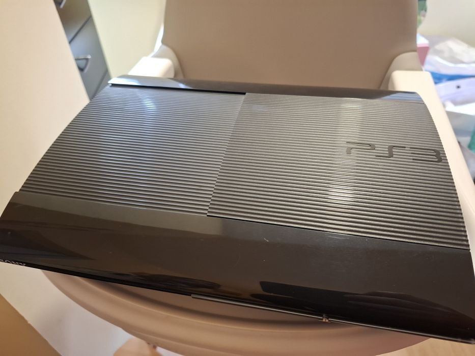 PS3 super slim com caixa original