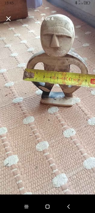 Boneco de pedra para enfeitar