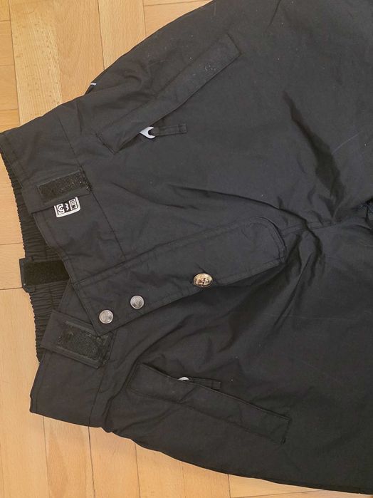 Czarne spodnie sportowe marki Protech Activewear Dynamics.