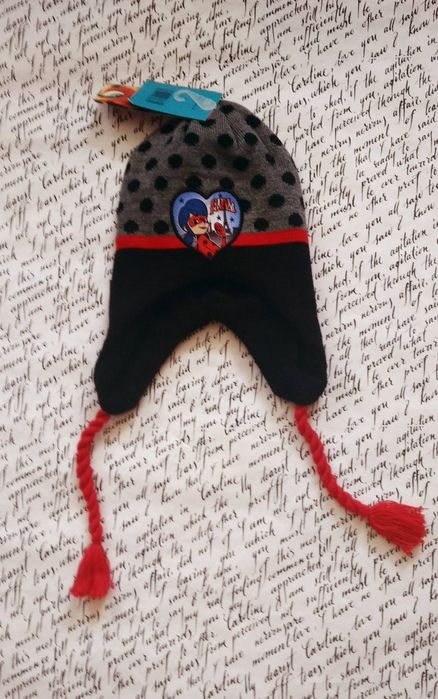 Зимова шапка для дівчинки