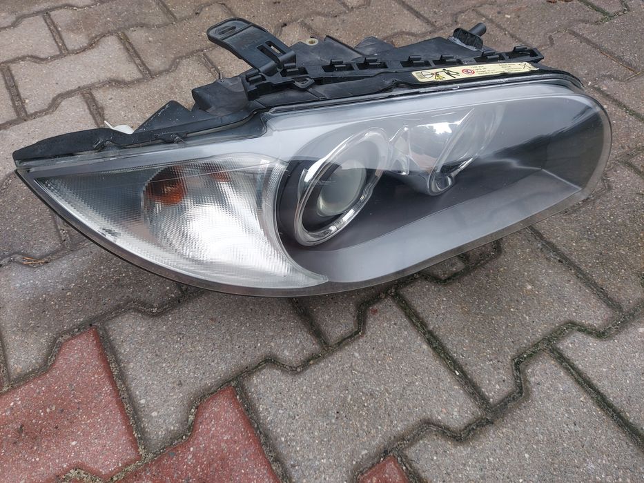 Lampa reflektor BMW E81 E82 E87 E88 xenon skrętna dynamic prawa