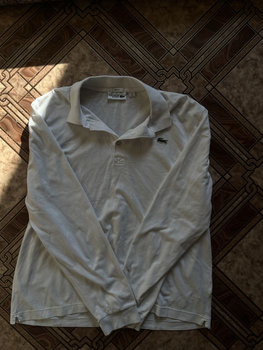 поло lacoste білого кольору