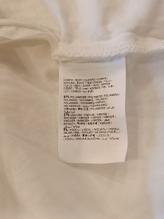 2 koronkowe spódniczki białe OVS r. 140