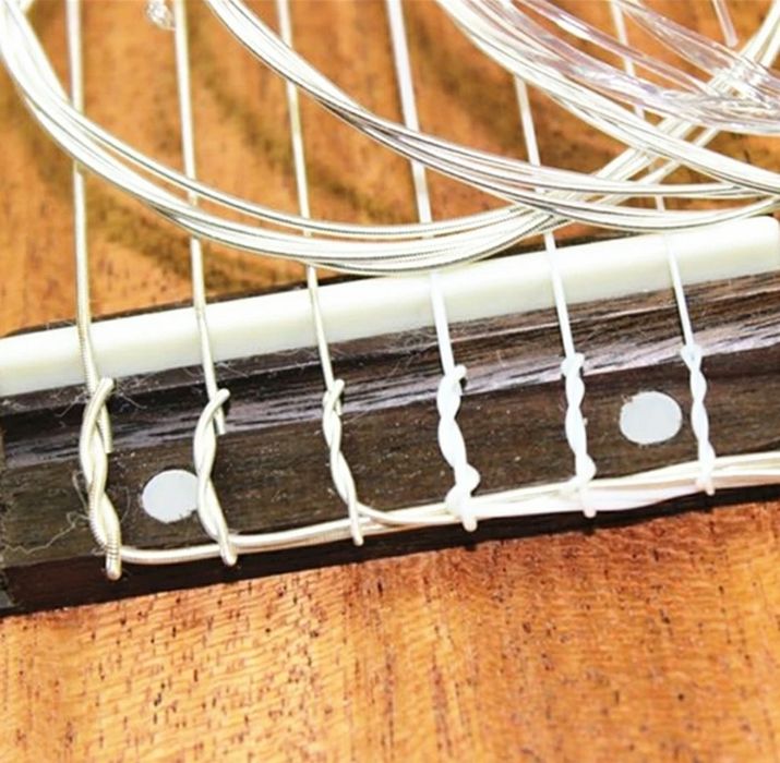 Струни медіатор каподастр