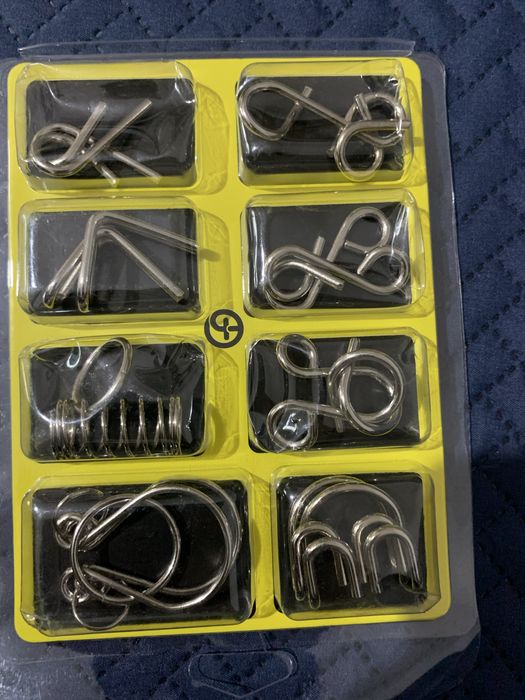 Головоломки металеві