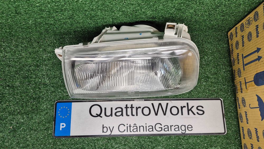 VW VENTO-11.91-09.98 -ÓTICA/FAROL FRENTE ESQUERDA NOVO ORIGINAL HELLA
