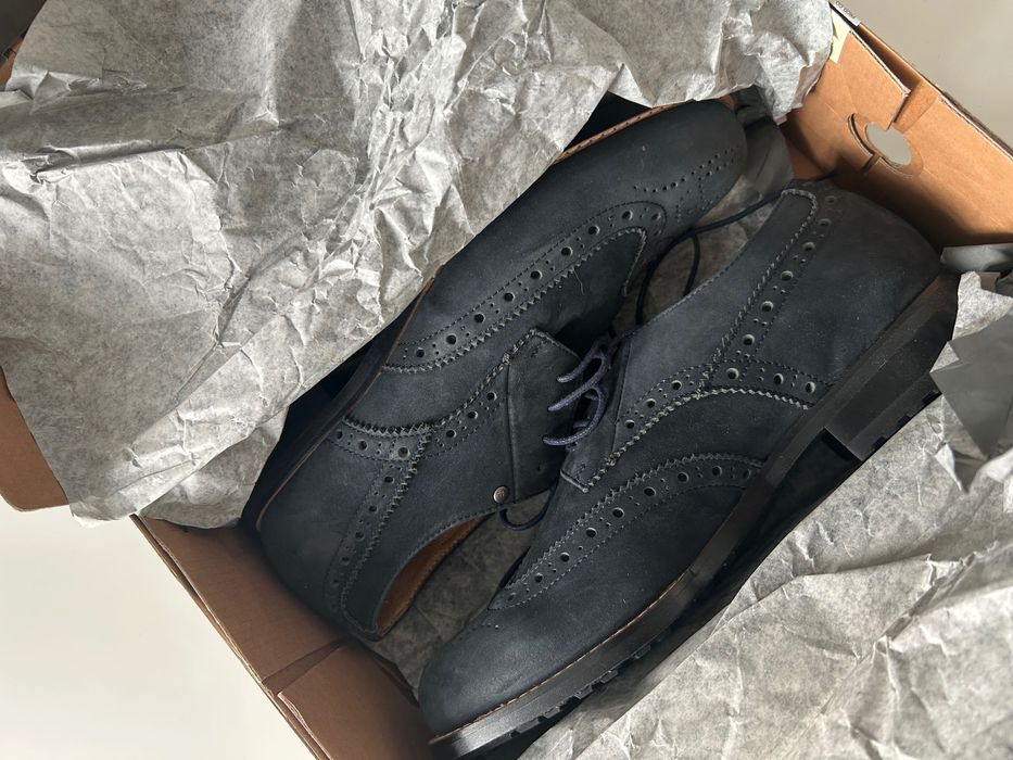 Sapatos de pele azul