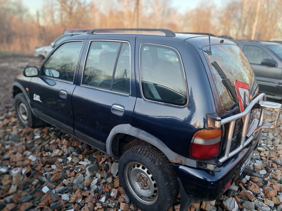 двері  скло Kia Sportage 1 93-02