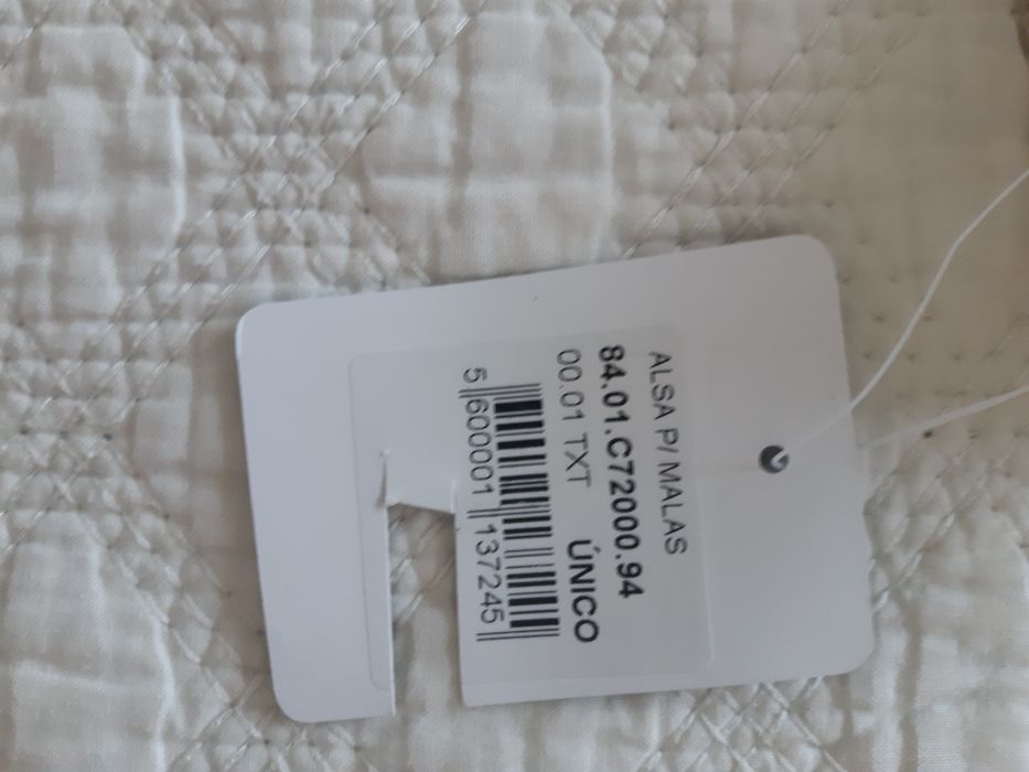 Alça para malas em tons creme