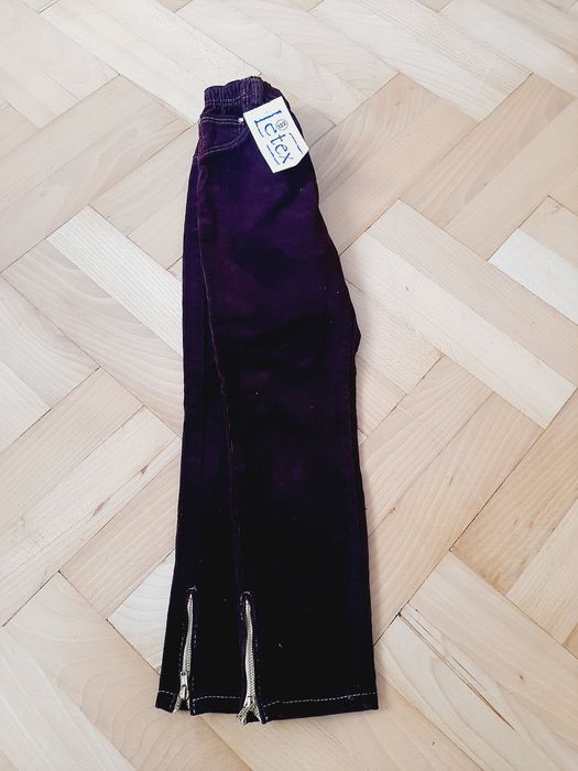 Spodnie ze złotymi zamkami 122cm