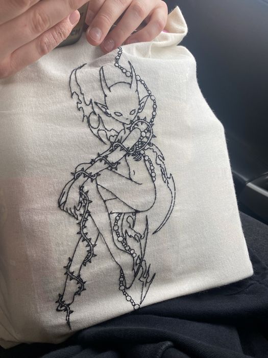 Torby lub koszulki ręcznie wyszywane