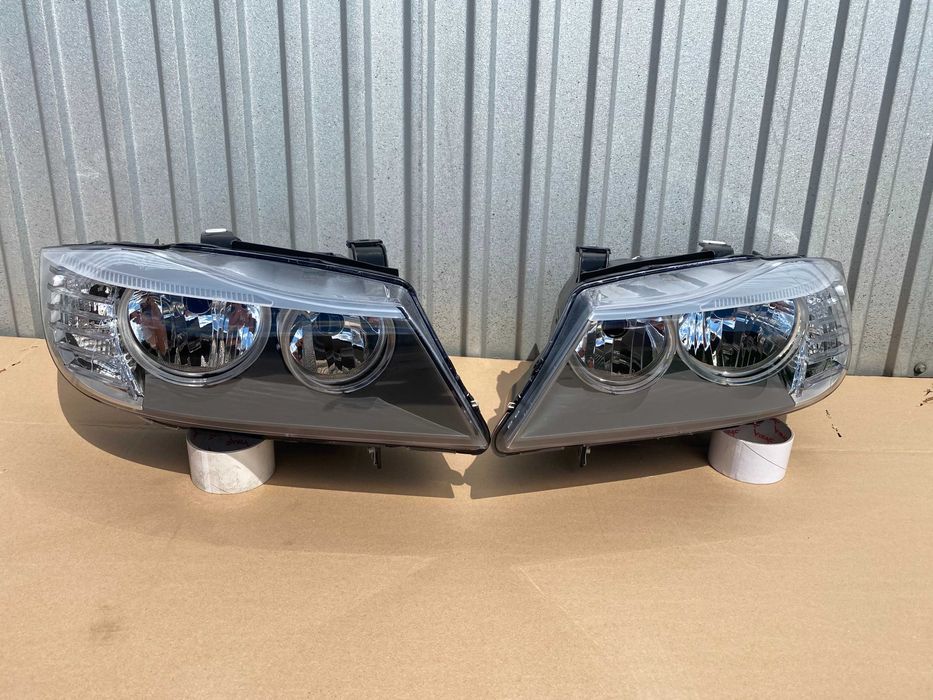 BMW E90 lift 2008 - lampa przednia lewa nowa