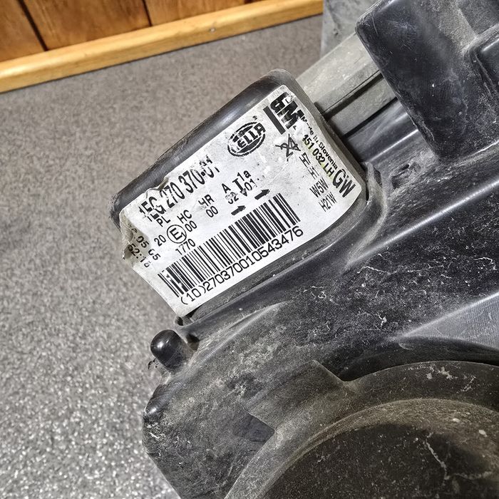 Фари передні Opel Astra H, Орель Астра Н 1EG27037001 1EG27037002