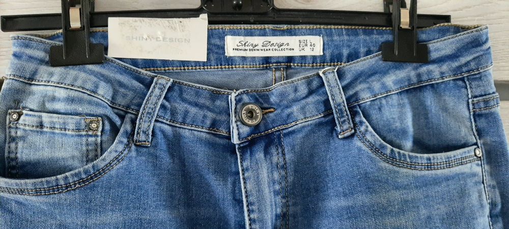 Nowe jeansy L jasne