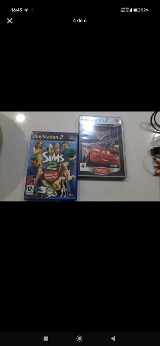 PlayStation 2 com jogos comandos e micros tudo em bom estado