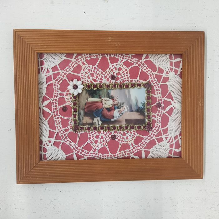 Quadro com registros antigos de São José 
bordas em mármore

Em excele