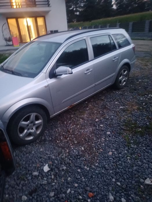 Drzwi prawe astra H kombi z157 lift kompletne