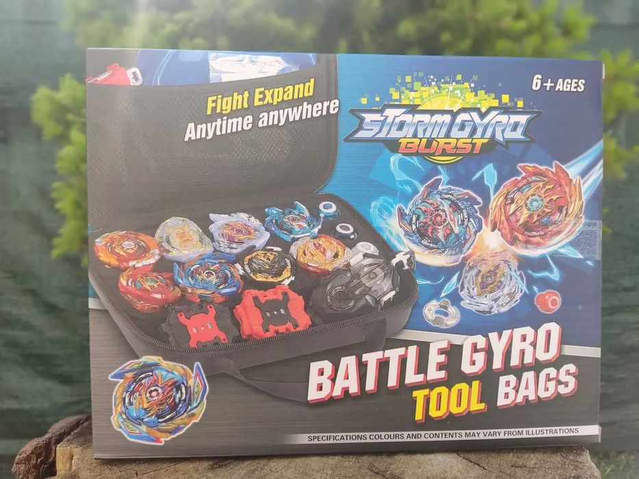набір BeyBlade 8 бейблейдів ручки та механізми запуску в кейсі арена.